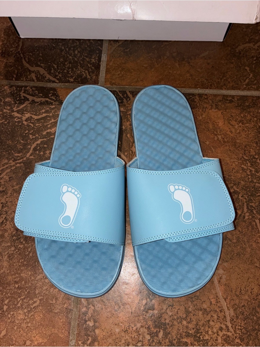 Men's Light Blue Slide Sandals with UNC Tar Heels footprint logo